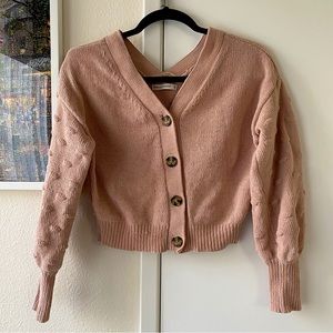 pink button-up sweater top